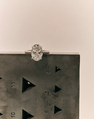 Montaigne Oval Solitaire Swept Shoulder Engagement Ring