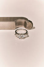 Cornelia Round Brilliant Pear Side Stone Engagement Ring