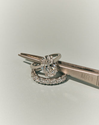 Montaigne Oval Solitaire Swept Shoulder Engagement Ring