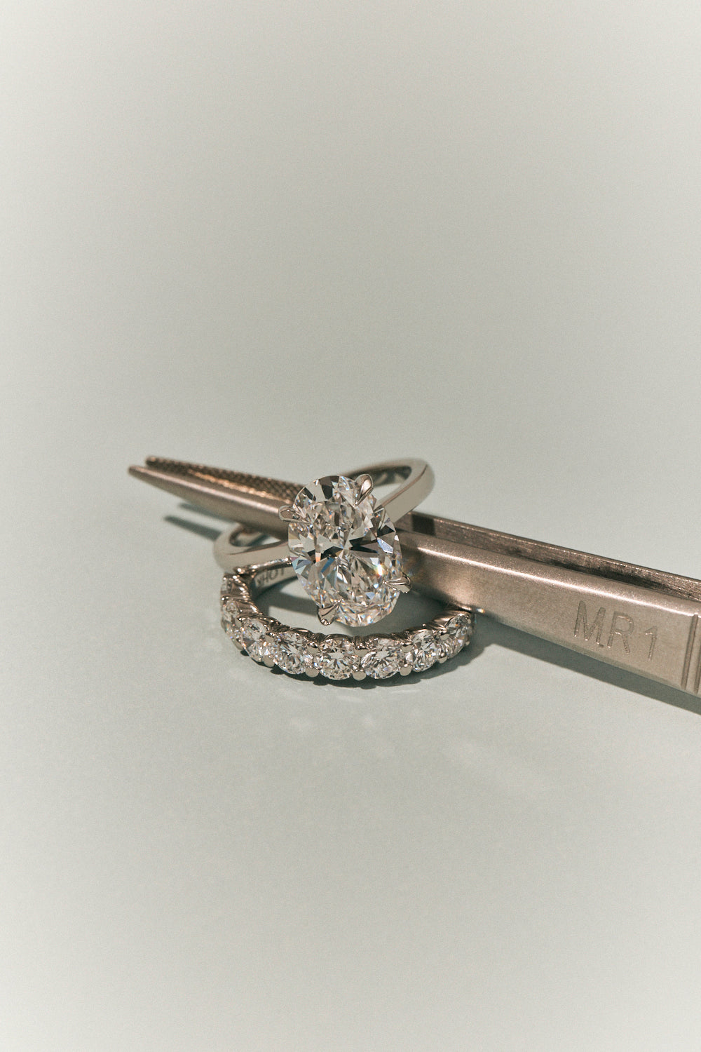 Montaigne Oval Solitaire Swept Shoulder Engagement Ring