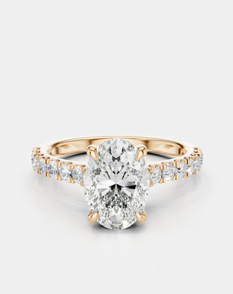 Nassau oval cut diamond band engagement ring in 18ct rose gold
