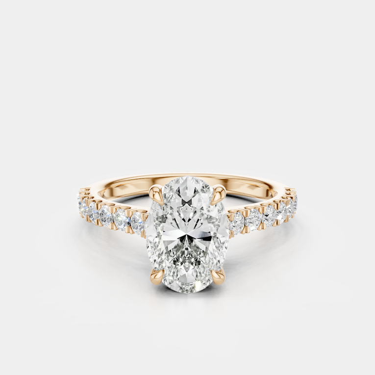Nassau oval cut diamond band engagement ring in 18ct rose gold