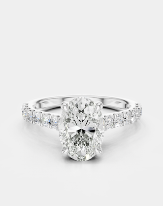 Nassau oval cut diamond band engagement ring in 18ct white gold