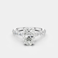 Nassau oval cut diamond band engagement ring in 18ct white gold