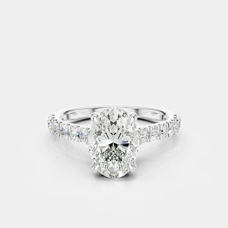 Nassau oval cut diamond band engagement ring in 18ct white gold