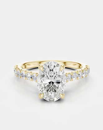 Nassau oval cut diamond band engagement ring in 18ct yellow gold