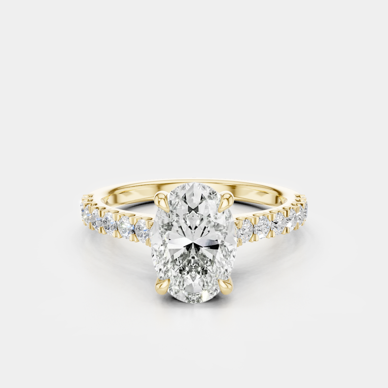Nassau oval cut diamond band engagement ring in 18ct yellow gold