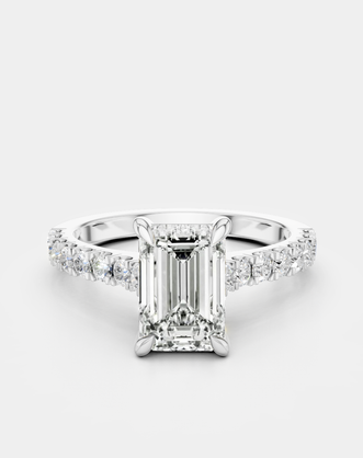 Beverly emerald cut diamond band engagement ring in 18ct white gold 