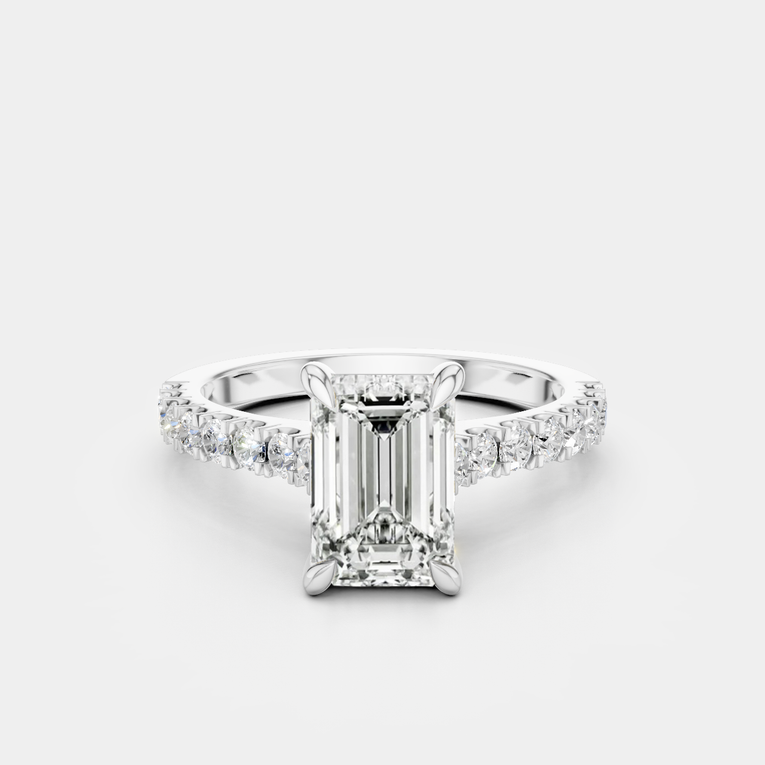 Beverly emerald cut diamond band engagement ring in 18ct white gold 