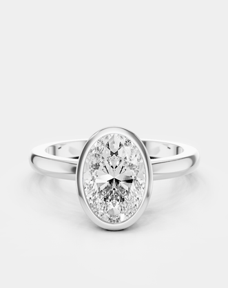 Fairfax oval solitaire bezel north-south engagement ring in 18ct white gold