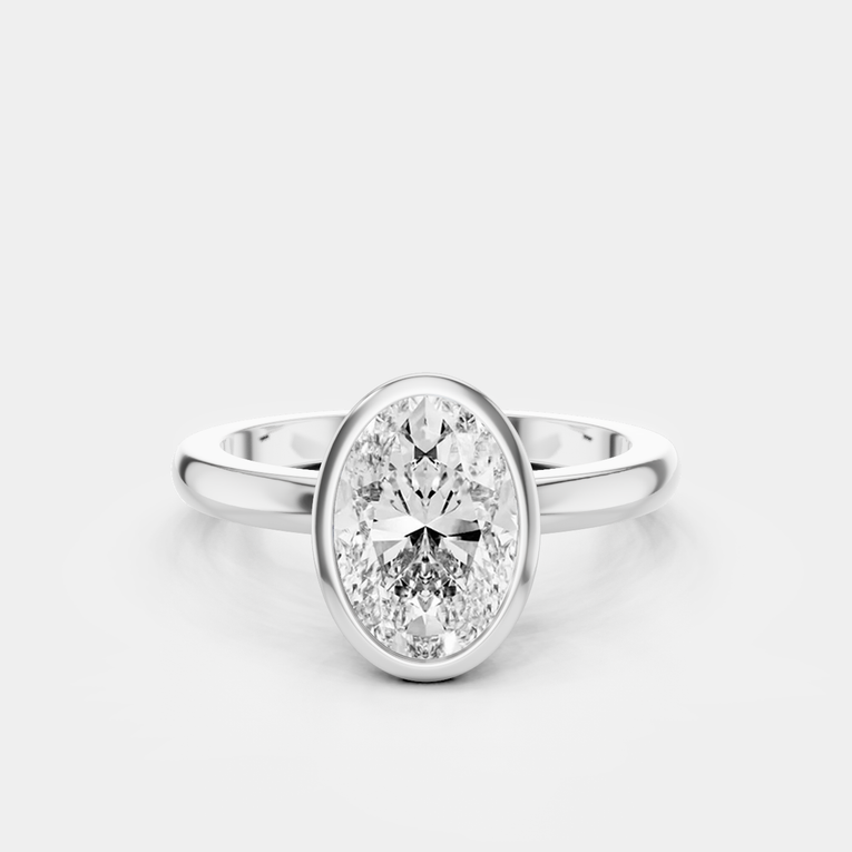 Fairfax oval solitaire bezel north-south engagement ring in 18ct white gold