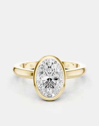 Fairfax oval solitaire bezel north-south engagement ring in 18ct yellow gold