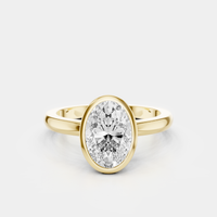 Fairfax oval solitaire bezel north-south engagement ring in 18ct yellow gold