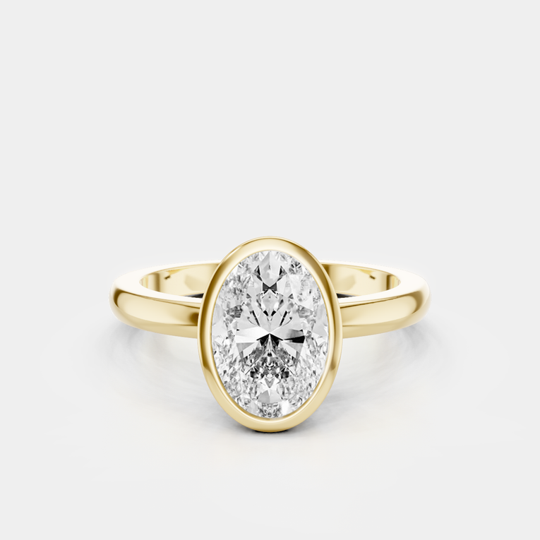 Fairfax oval solitaire bezel north-south engagement ring in 18ct yellow gold