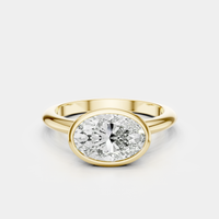 Maddox oval solitaire bezel east-west engagement ring in 18ct yellow gold