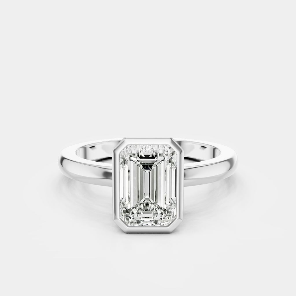 Sutton emerald cut solitaire bezel north-south engagement ring in platinum