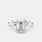 Sutton emerald cut solitaire bezel north-south engagement ring in platinum
