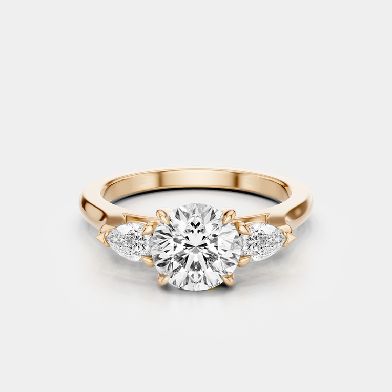 Cornelia round brilliant pear side stone engagement ring with lab-grown diamond band in 18ct rose gold