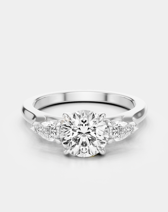 Cornelia round brilliant pear side stone engagement ring with lab-grown diamond band in 18ct white gold