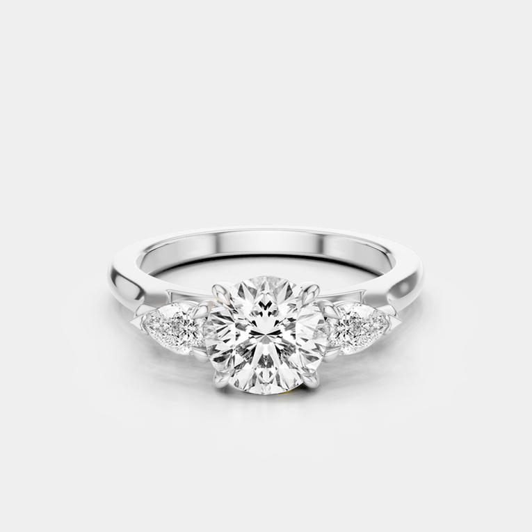 Cornelia round brilliant pear side stone engagement ring with lab-grown diamond band in 18ct white gold