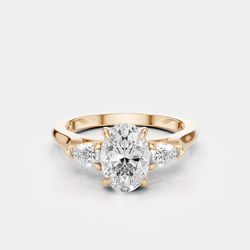 Bonaparte oval pear side stone engagement ring in 18ct rose gold