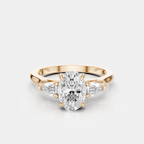 Bonaparte oval pear side stone engagement ring in 18ct rose gold