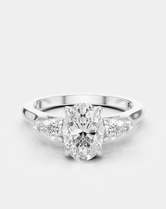 Bonaparte oval pear side stone engagement ring in 18ct white gold