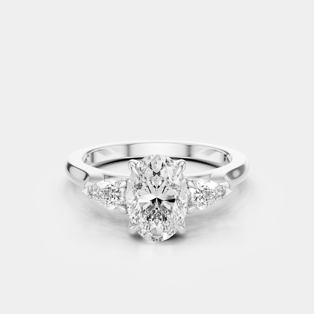 Bonaparte oval pear side stone engagement ring in 18ct white gold