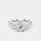 Bonaparte oval pear side stone engagement ring in 18ct white gold