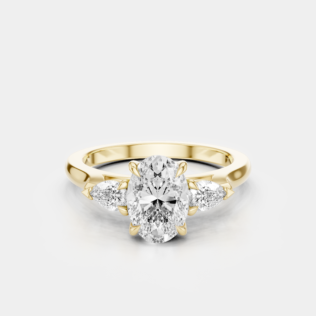 Bonaparte oval pear side stone engagement ring in 18ct yellow gold