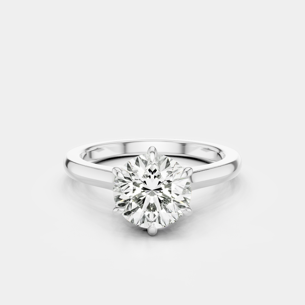 Cambon round brilliant six claw solitaire swept shoulder engagement ring in 18ct white gold