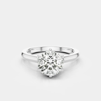 Cambon round brilliant six claw solitaire swept shoulder engagement ring in 18ct white gold