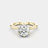 Cambon round brilliant six claw solitaire swept shoulder engagement ring in 18ct yellow gold