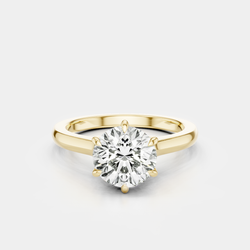 Cambon round brilliant six claw solitaire swept shoulder engagement ring in 18ct yellow gold