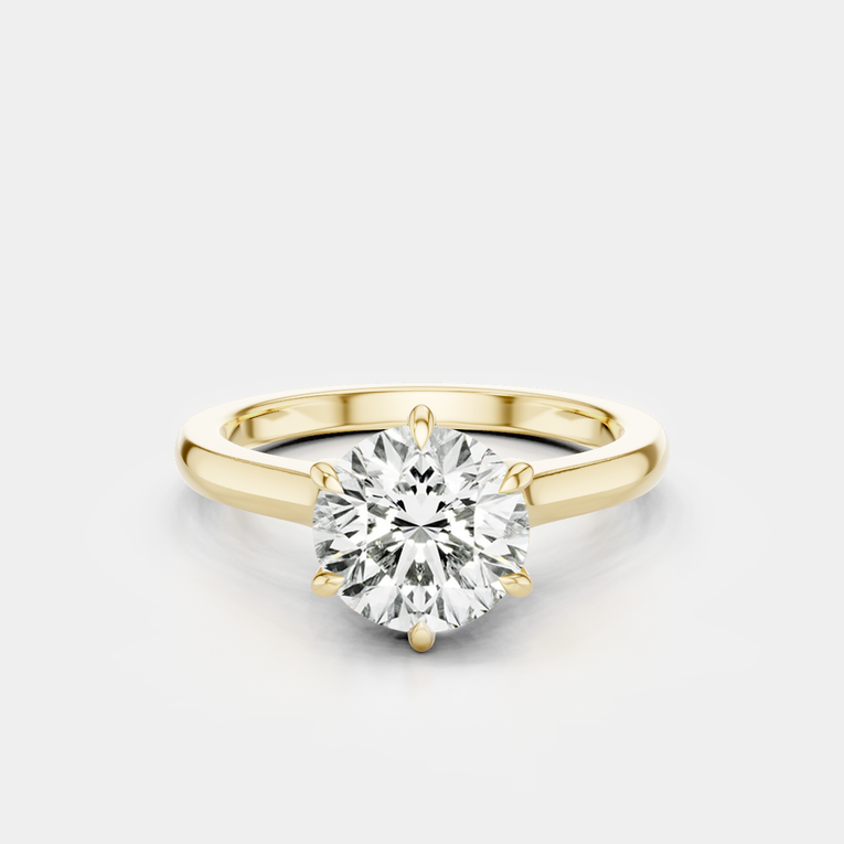 Cambon round brilliant six claw solitaire swept shoulder engagement ring in 18ct yellow gold