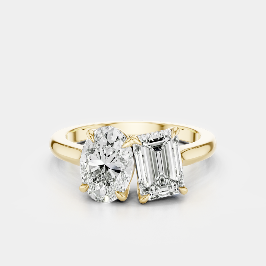 Bowery Toi Et Moi oval emerald engagement ring in 18ct yellow gold