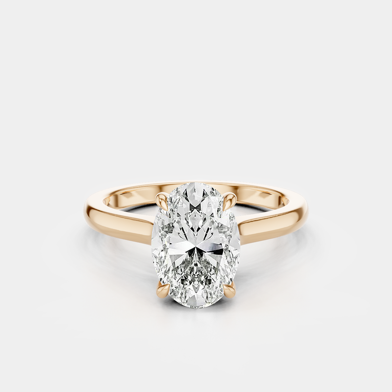 Montaigne oval solitaire swept shoulder engagement ring in 18ct rose gold
