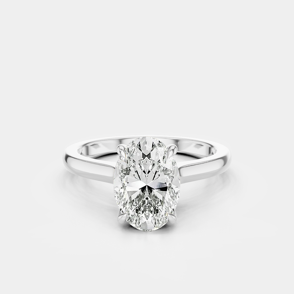 Montaigne oval solitaire swept shoulder engagement ring in 18ct white gold