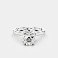 Montaigne oval solitaire swept shoulder engagement ring in 18ct white gold