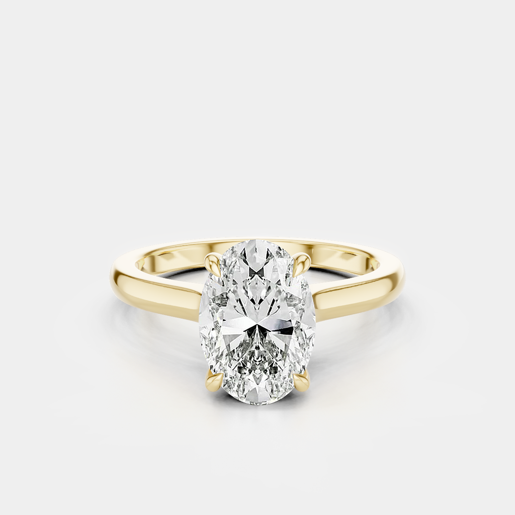 Montaigne oval solitaire swept shoulder engagement ring in 18ct yellow gold