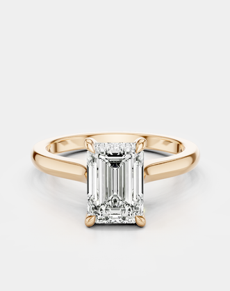 Dover emerald cut solitaire swept shoulder engagement ring in 18ct rose gold