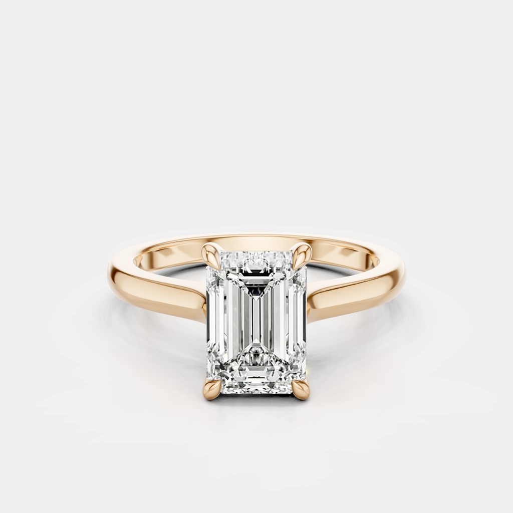 Dover emerald cut solitaire swept shoulder engagement ring in 18ct rose gold