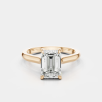 Dover emerald cut solitaire swept shoulder engagement ring in 18ct rose gold