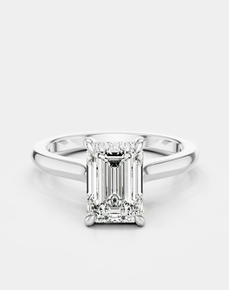Dover emerald cut solitaire swept shoulder engagement ring in 18ct white gold