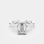 Dover emerald cut solitaire swept shoulder engagement ring in 18ct white gold