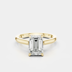 Dover emerald cut solitaire swept shoulder engagement ring in 18ct yellow gold