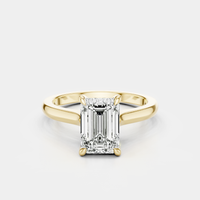 Dover emerald cut solitaire swept shoulder engagement ring in 18ct yellow gold