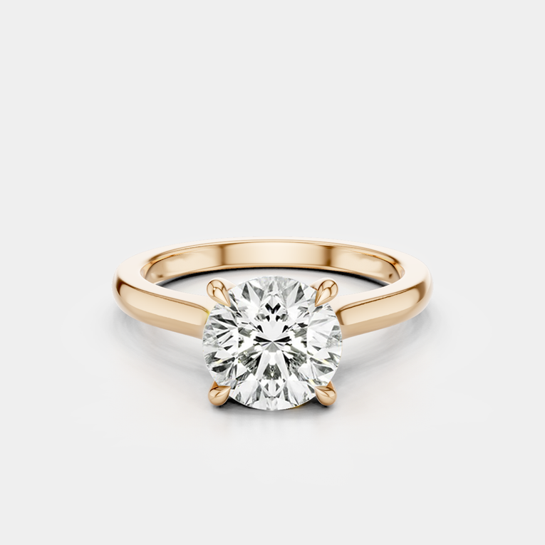 Sloane round brilliant four claw solitaire swept shoulder engagement ring in 18ct rose gold