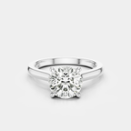 Sloane round brilliant four claw solitaire swept shoulder engagement ring in 18ct white gold