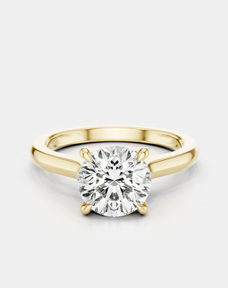 Sloane round brilliant four claw solitaire swept shoulder engagement ring in 18ct yellow gold